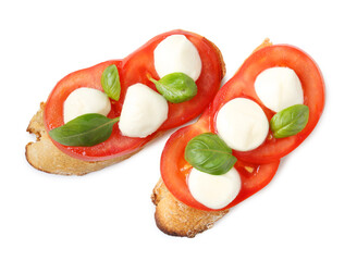 Tasty sandwiches with mozzarella cheese, tomatoes and basil on white background, top view