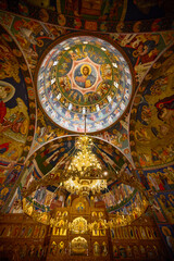 image from inside a church in Romania with paintings specific to the area and the Orthodox religion