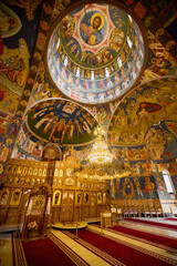 image from inside a church in Romania with paintings specific to the area and the Orthodox religion