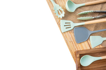 set kitchen utensils on a bamboo mat with a transparent background. shot with high angle view