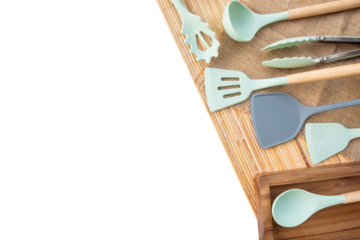 set kitchen utensils on a bamboo mat with a transparent background. shot with high angle view