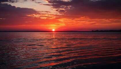 Obraz premium red sunset over the sea river volga