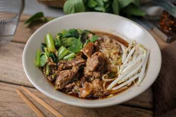 Stewed pork with thin rice noodles Noodles soup,	