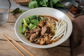 Stewed pork  with thin rice noodles Noodles soup,