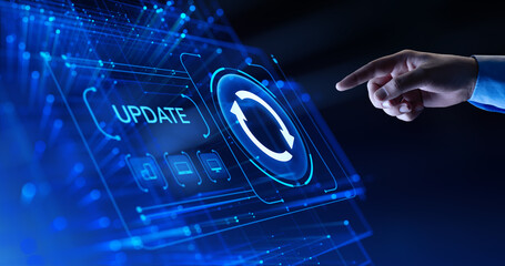 Hand Touching Update Icon on Screen - Software Upgrade Concept