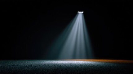 Dramatic Spotlight Illuminating an Empty Dark Space with Soft Shadows and Vibrant Light Contrast, Perfect for Abstract Concepts, Theater, and Artistic Background Use