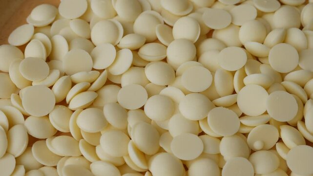 White chocolate chips Pistols buttons. Confection and pastry concept.