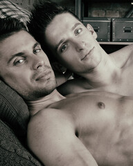 Young attractive gay couple and love.