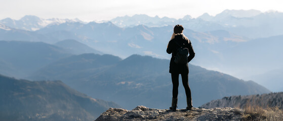Girl hiking in the mountains