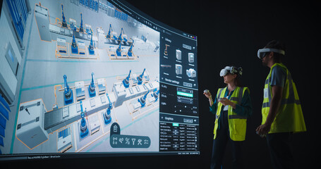 Female and Male Engineers Wearing VR Headsets and Collaborating on a Robotics Factory Modular...