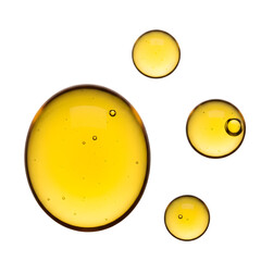 Several golden oil drops with transparent bubbles isolated on transparent background, representing beauty, skincare, or natural ingredients