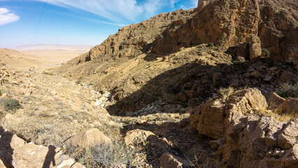 Rugged Desert Landscape with Rocky Cliffs