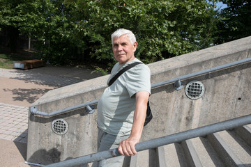 Active Senior Man Traveling  in New York City.  A 75-year-old man explores the streets of New York City, embracing adventure and independence in his golden years.