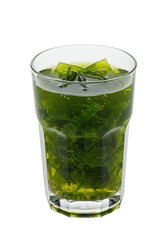 Green, refreshing beverage in glass. Floating seaweed, or herbs, and bubbles add texture