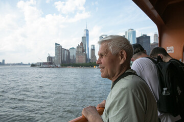 Active Senior Man Traveling  in New York City.  A 75-year-old man explores the streets of New York City, embracing adventure and independence in his golden years.