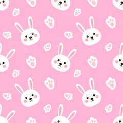 Cute bunny face and paw pattern on pink background. Adorable and playful design perfect for kids, baby products, or nursery decor.