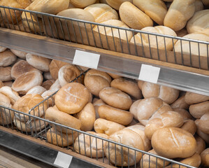 Kaiser rolls in the bakery, lots of different wheat rolls