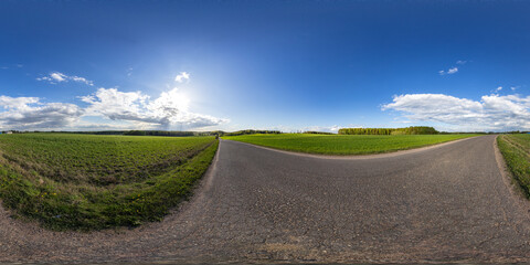 Full seamless spherical hdri panorama 360 degrees angle view on among fields in spring day with...