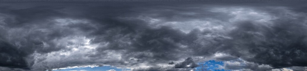 Dark sky with beautiful black clouds before storm. Seamless hdri panorama 360 degrees angle view...
