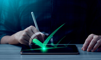 Business performance checklist, businessman using laptop doing online checklist survey, Check marks on checklist and Filling online form or answering questions. evaluation, online survey, online exam.
