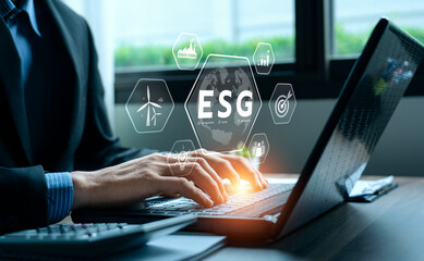 ESG environment social governance investment concept. Businessman using computer to analyze investment ESG. strategy that considers the environmental, company carbon labor practices, sustainability