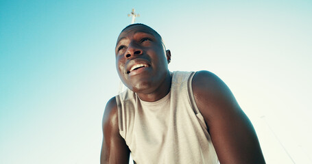Fitness, tired and black man on break with sweat outdoor for health, wellness and exhausted....