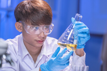 Science students analyze biochemical samples in the advanced science laboratory. Biotechnology research in the science laboratory.