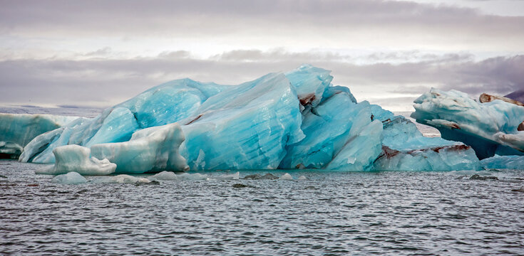 Icebergs in Jokulsarlon glacial lagoon in Iceland. - Powered by Adobe