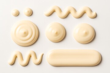 Various shapes of mayonnaise isolated on white background