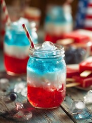 Colorful Red White and Blue Popsicle Cocktail in Mason Jars