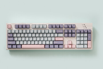 Mechanical new keyboard on blue background. Minimal style and design keyboard. Custom build...