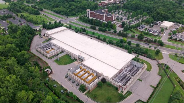 Data Center facility of outside infrastructure showing storage equipment in an aerial orbit view
