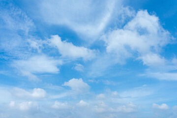 Obraz premium Serene Blue Sky with Fluffy White Clouds Natural Background Image