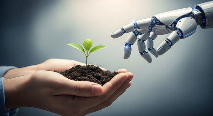 Human hands holding a seedling with a robotic hand for technological innovation and growth