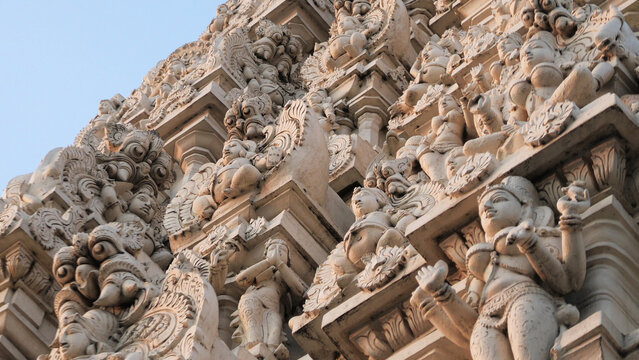 Closeup of intricate carvings on the tower of Kamakshi Temple, Kanchipuram, Tamil Nadu, India | Sri Kanchi Kamakshi Ambal Devasthanam