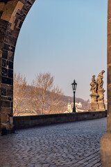 Historic Stone Archway Entrance to Charles Bridge in Prague, Vertical View