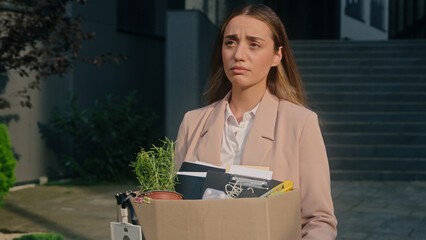 Caucasian stressed fired female woman girl lady with dismissal box leaving office businesswoman...