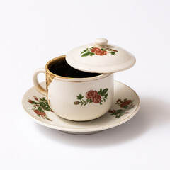 a cup of coffee in the living room with a white background