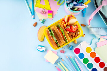 Back to school. Healthy school meal, children packed lunch box with fruit, berry, nuts, sandwich...