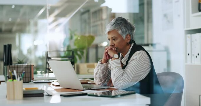 Laptop, thinking and business woman with stress, problem solving or challenge for project. Computer, reflection and serious mature manager with doubt, difficult decision and lack of ideas in office
