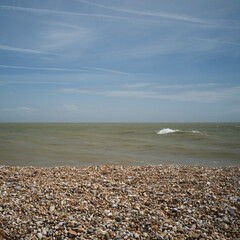 Dungeness, England, United Kingdom, 23rd May 2025,  shingle, waves and sky