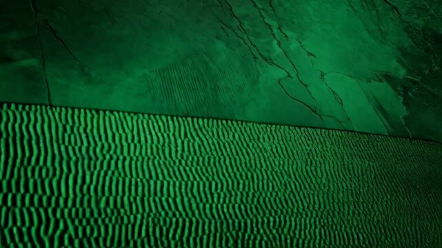 Deep emerald green textured background featuring subtle stone like marbling and fine linear detailing at the base, dark and moody