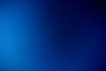 Fototapeta premium Vast deep blue night sky filled with countless twinkling stars and constellations