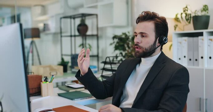 Headset, man and virtual assistant in office with communication, contact or crm networking. Mic, professional and male receptionist on call for appointment schedule, customer service or query.