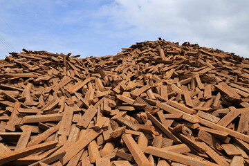 Pig iron , is an intermediate good used by the iron industry in the production of steel, which is developed by smelting iron ore in a blast furnace. Pig iron has a high carbon 3.5-4.5%