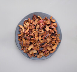 Healthy preserves dried fruits. Big plate of dried fruits. A pile of dried fruit. Lots of pieces of dry fruit. Dry fruit Plate