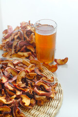 Compote dried fruits. Refreshing drink made from dried fruits. A pile of dried fruit. Lots of pieces of dry fruit. Glass of compote