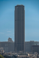 Paris, France - 06 28 2025: Panoramic view of Montparnasse Tower backlit and West South Paris districts from the roof of the Saint-Jacques TowerParis,