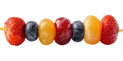 Fresh fruit skewer with strawberries and grapes on a black background Healthy eating concept with colorful, juicy, and refreshing summer snack