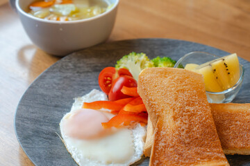 Healthy Breakfast with Toast, Sunny Side Up Egg and Fruit / トーストと目玉焼きとフルーツの健康的な朝食
